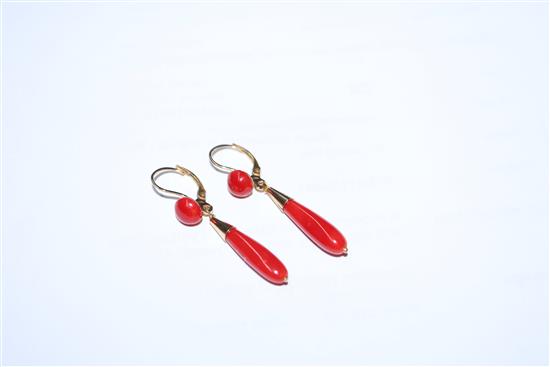 A modern pair of Italian 750 yellow metal and coral drop earrings, overall 41mm.